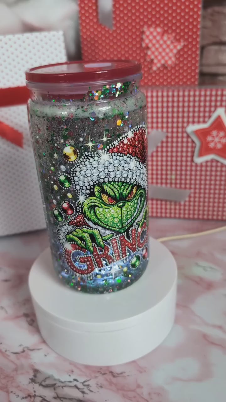 Verre Snowglobe plastique noir pailleté sur support, effet paillettes visible